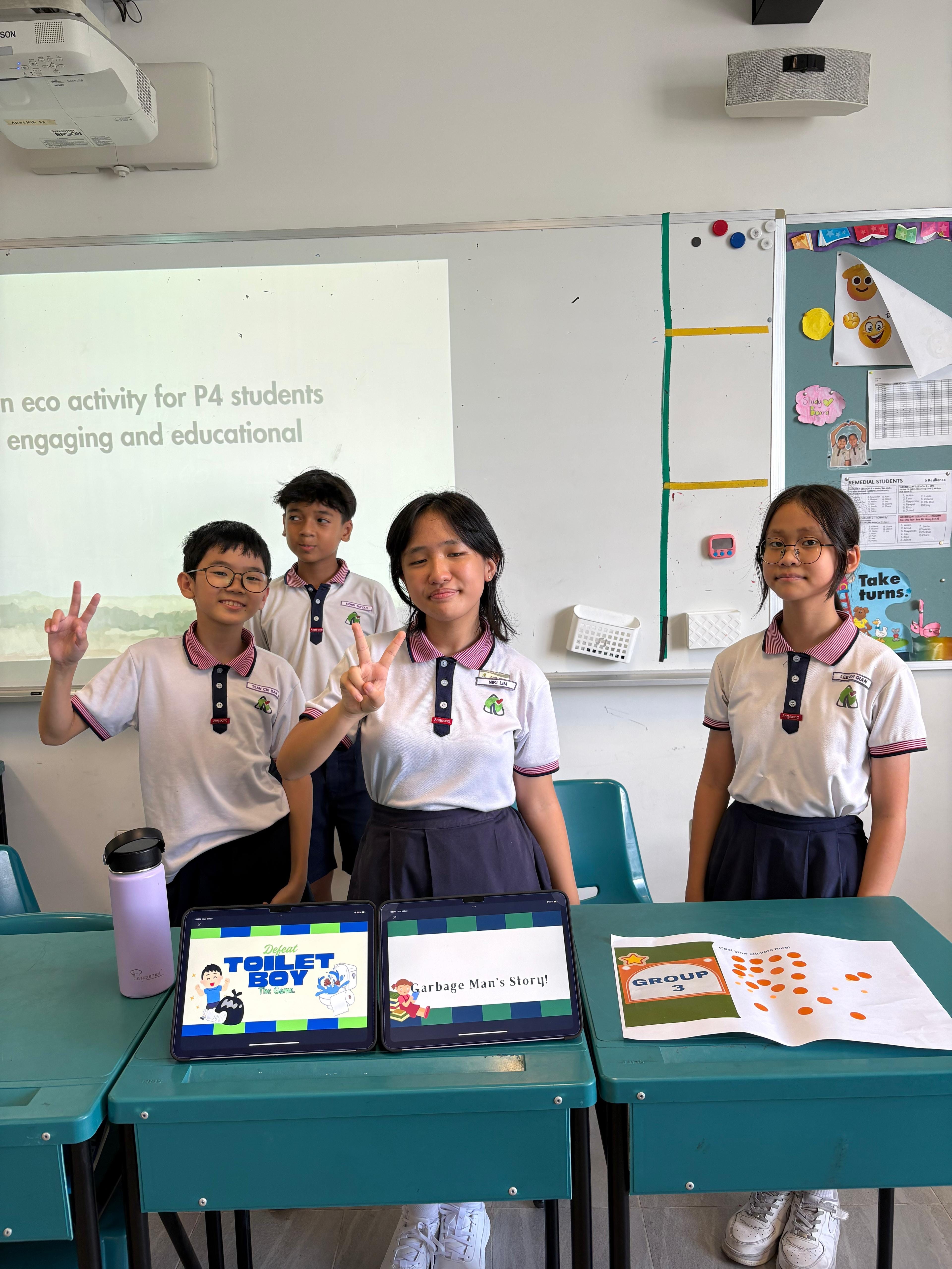 Students presenting their artefacts in front of the class